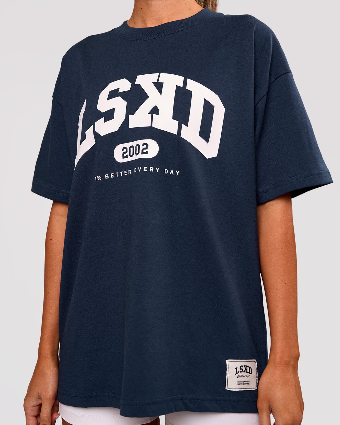Woman wearing Varsity EST Heavyweight Oversized Tee  - Future Navy-White | Model:Charli | Size:XS - view 7