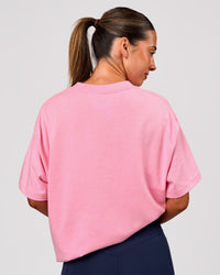 Woman wearing Varsity EST Heavyweight Oversized Tee  - Pink Rose-Future Navy | Model:Charli | Size:XS | Thumbnail Index: 3
