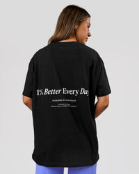 Woman wearing VS26 1% Better FLXCotton Oversize Tee - Black-White | Model:Charli | Size:XS | Thumbnail Index: 2