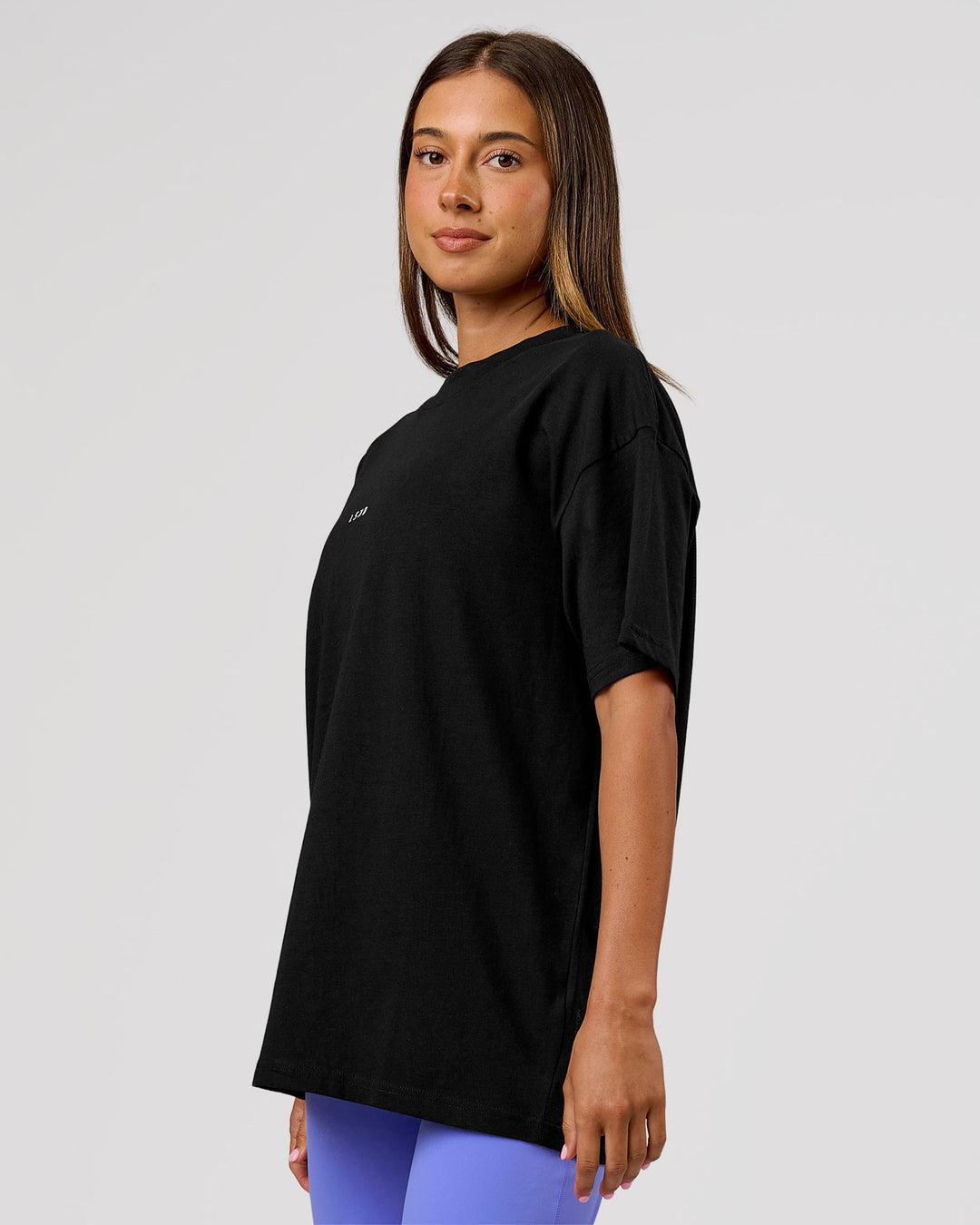 Woman wearing VS26 1% Better FLXCotton Oversize Tee - Black-White | Model:Charli | Size:XS - view 9