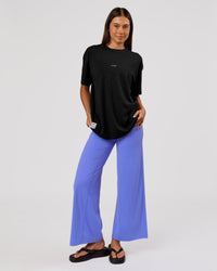 Woman wearing VS26 1% Better FLXCotton Oversize Tee - Black-White | Model:Charli | Size:XS | Thumbnail Index: 10