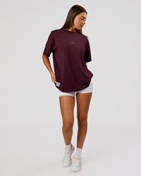 Woman wearing VS26 1% Better FLXCotton Oversize Tee - Cherry Lacquer-Off White | Model:Charli | Size:XS | Thumbnail Index: 10
