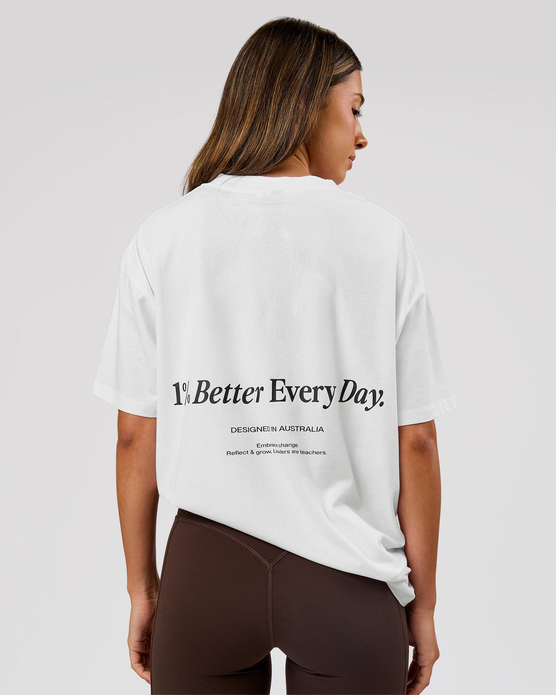 Woman wearing VS26 1% Better FLXCotton Oversize Tee - White-Black | Model:Charli | Size:XS - view 3