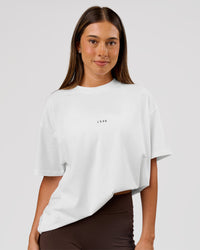 Woman wearing VS26 1% Better FLXCotton Oversize Tee - White-Black | Model:Charli | Size:XS | Thumbnail Index: 5