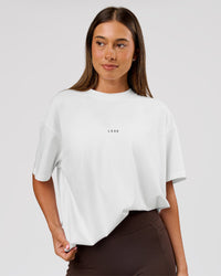 Woman wearing VS26 1% Better FLXCotton Oversize Tee - White-Black | Model:Charli | Size:XS | Thumbnail Index: 8
