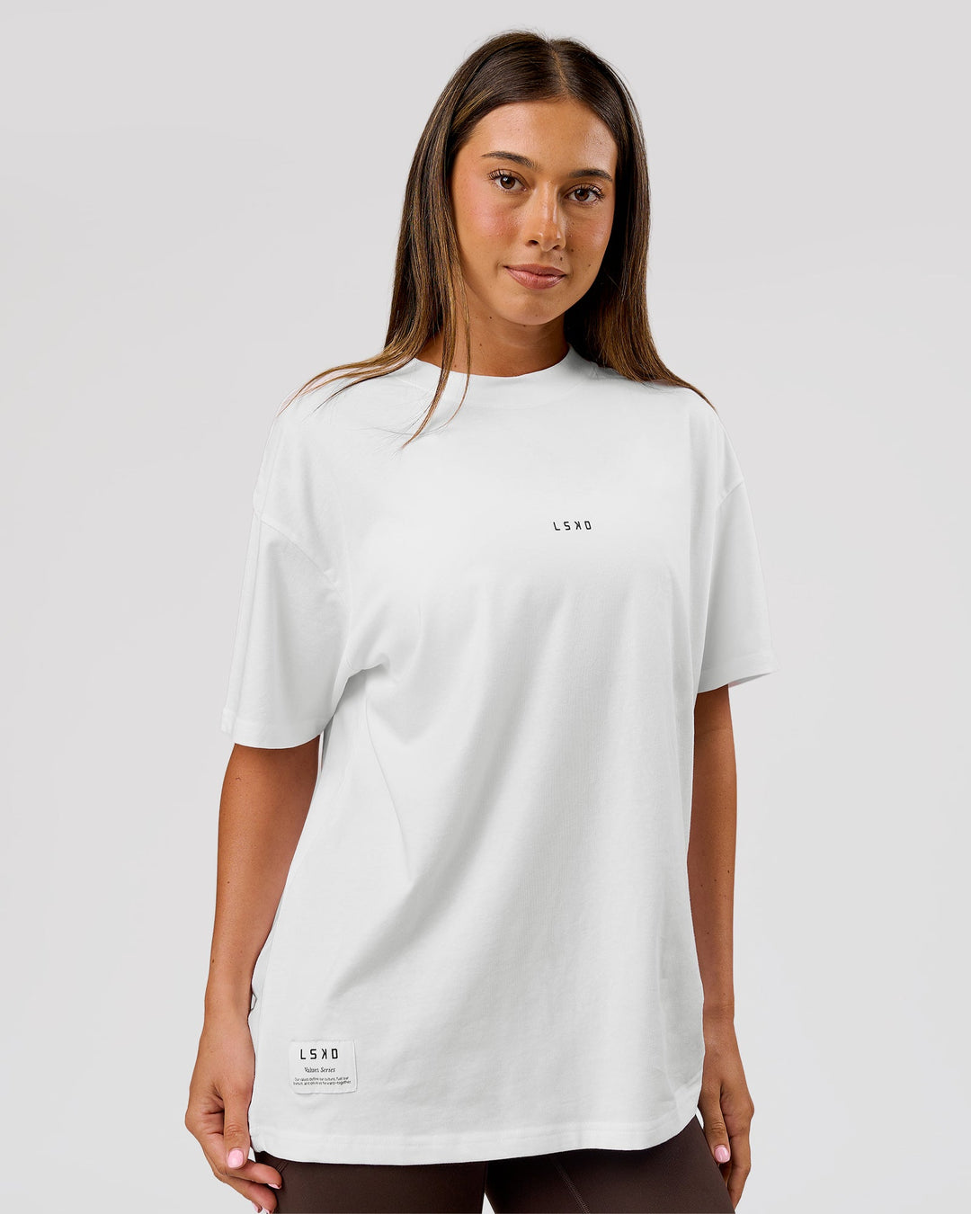 Woman wearing VS26 1% Better FLXCotton Oversize Tee - White-Black | Model:Charli | Size:XS - view 13