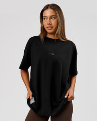 Woman wearing VS26 MFBS FLXCotton Oversize Tee - Black-White | Model:Charli | Size:XS | Thumbnail Index: 7