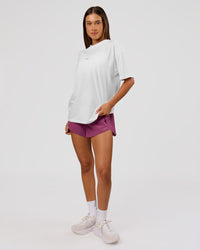 Woman wearing VS26 MFBS FLXCotton Oversize Tee - White-Black | Model:Charli | Size:XS | Thumbnail Index: 9