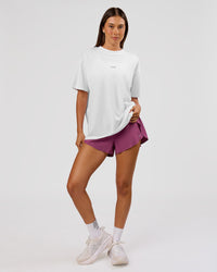Woman wearing VS26 MFBS FLXCotton Oversize Tee - White-Black | Model:Charli | Size:XS | Thumbnail Index: 12