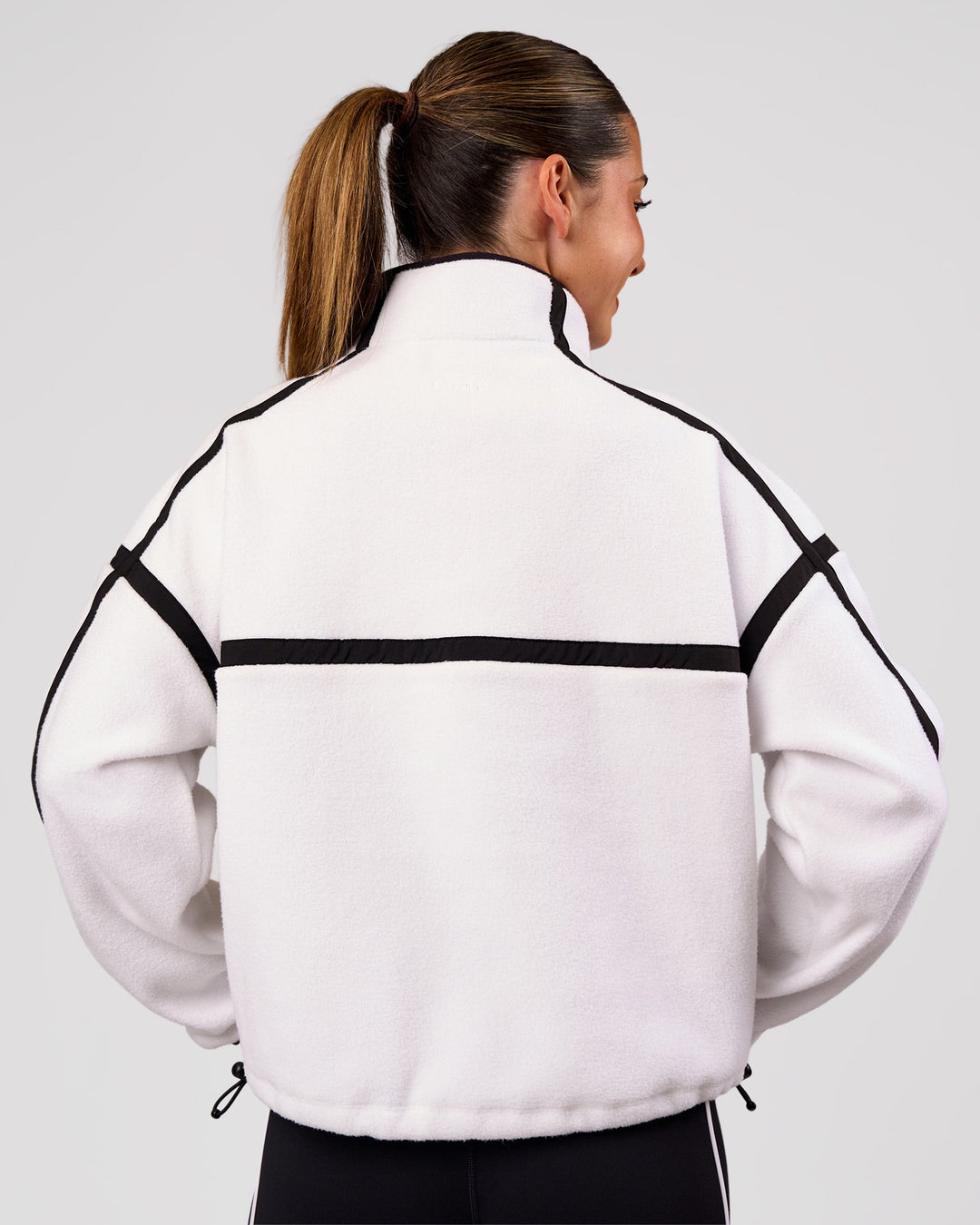 Woman wearing Expedition Pop Over - White-Black | Model:Charli | Size:XS - view 6