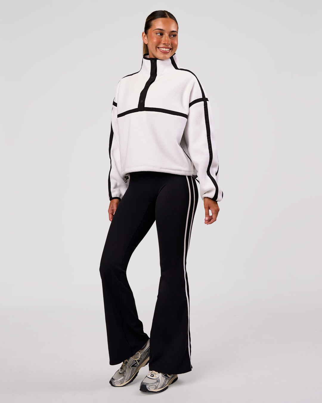Woman wearing Expedition Pop Over - White-Black | Model:Charli | Size:XS - view 9
