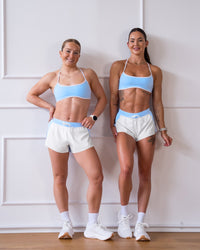 Woman wearing Strong is Beautiful Sports Bra - Open Air-White | Model:Charlotte | Size:XS | Thumbnail Index: 10
