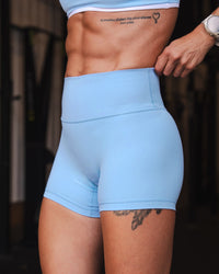 Woman wearing Strong is Beautiful Fusion High-Rise 4" Short - Open Air | Model:Charlotte | Size:XS | Thumbnail Index: 1