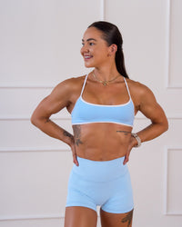 Woman wearing Strong is Beautiful Fusion High-Rise 4" Short - Open Air | Model:Charlotte | Size:XS | Thumbnail Index: 3