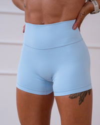 Woman wearing Strong is Beautiful Fusion High-Rise 4" Short - Open Air | Model:Charlotte | Size:XS | Thumbnail Index: 10