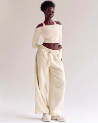 Woman wearing Bree Barrel Fleece Track Pant - Vanilla Bean | Model:Desleigh | Size:XS | Thumbnail Index: 7