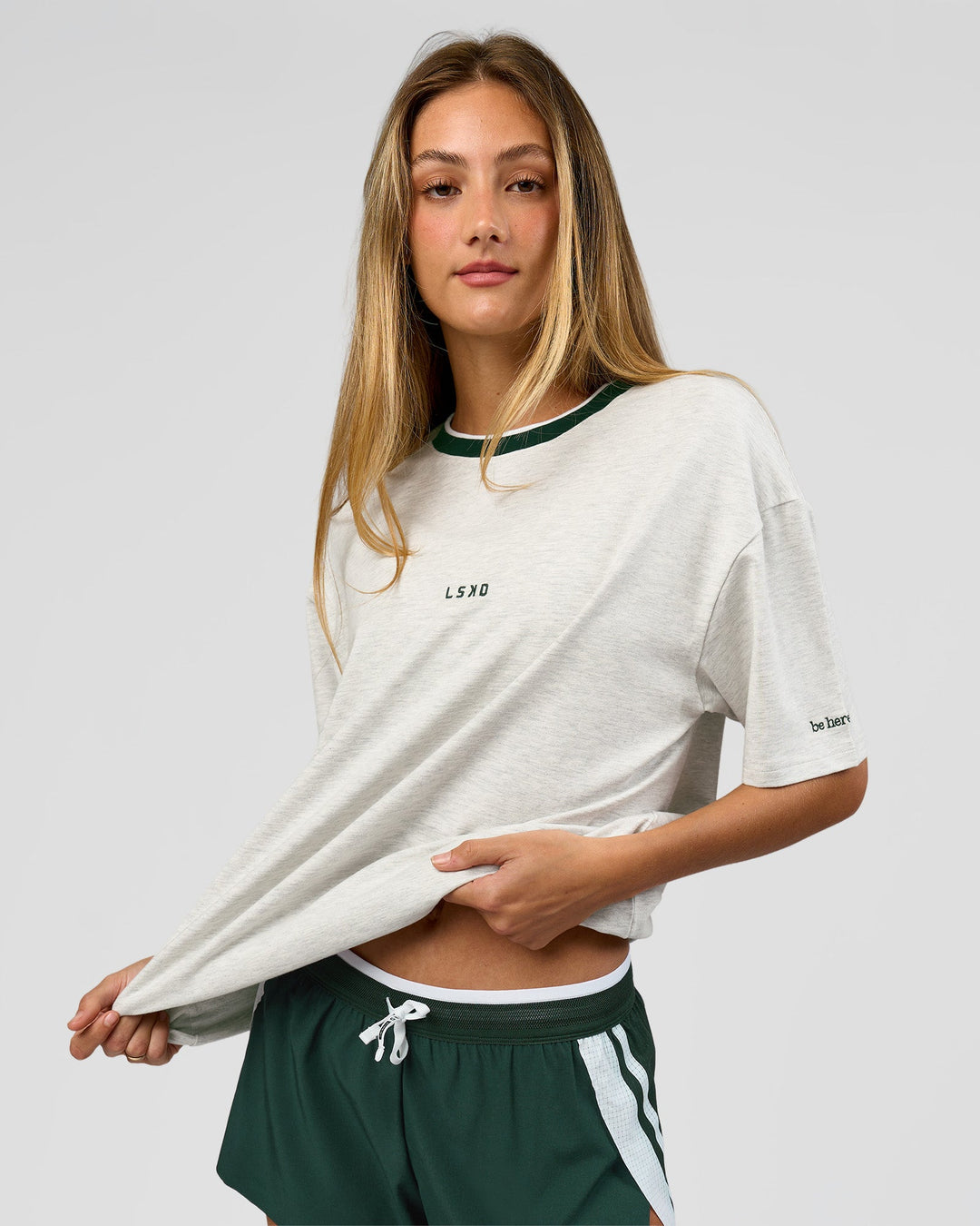 Woman wearing Be Here Now Heavyweight FLXCotton Tee Oversize - Silver Marl-Midnight Green | Model:Georgia | Size:XS - view 13