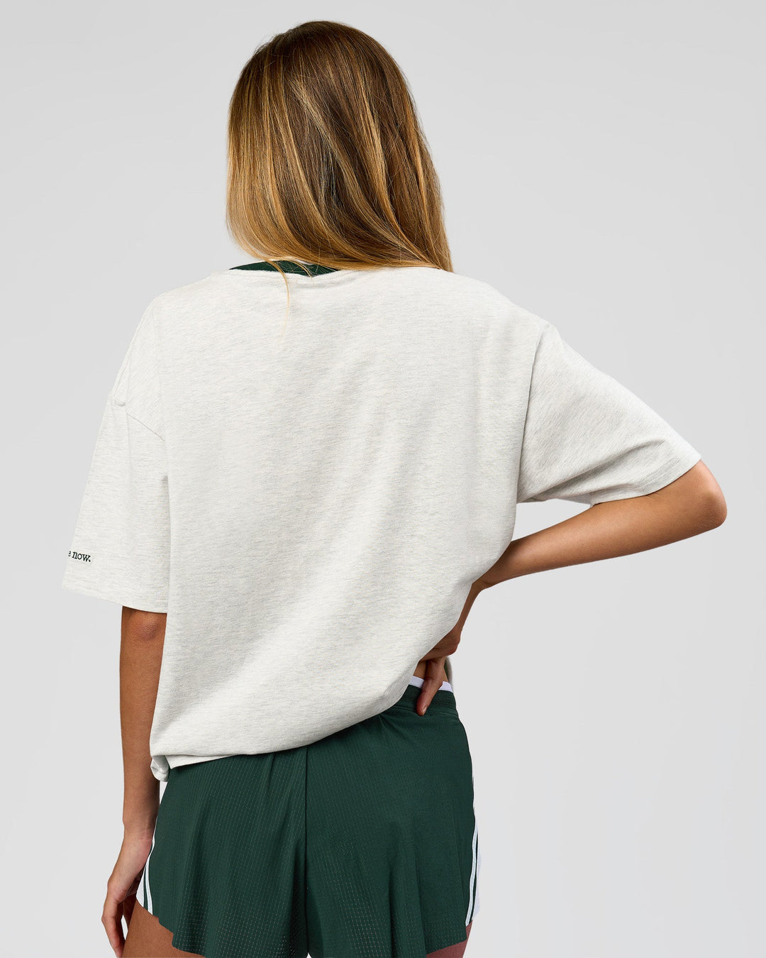 Woman wearing Be Here Now Heavyweight FLXCotton Tee Oversize - Silver Marl-Midnight Green | Model:Georgia | Size:XS - view 10