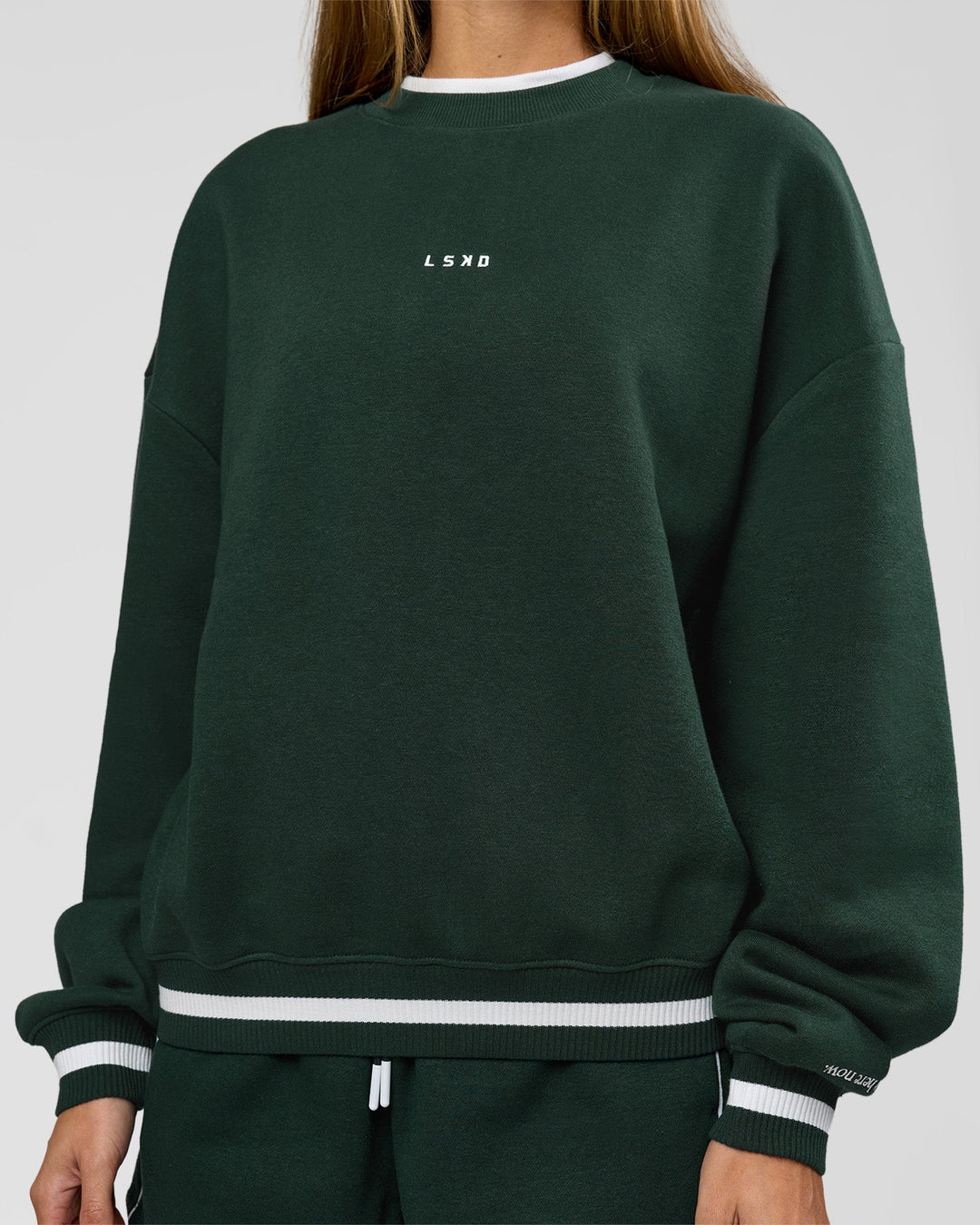 Woman wearing Go-To Dual Oversized Sweater - Midnight Green-White | Model:Georgia | Size:XS - view 3