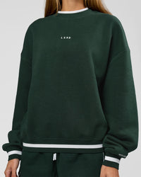 Woman wearing Go-To Dual Oversized Sweater - Midnight Green-White | Model:Georgia | Size:XS | Thumbnail Index: 2