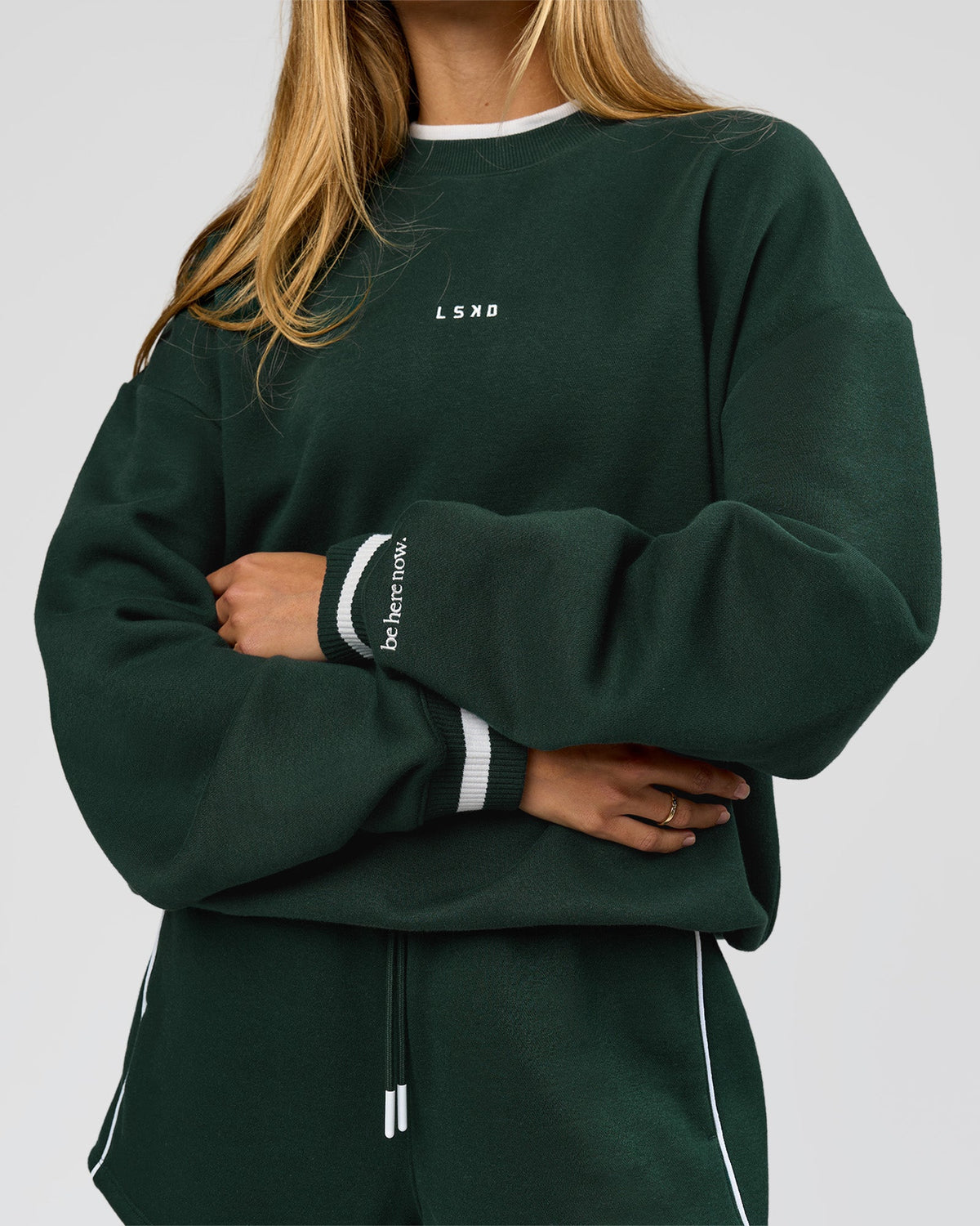 Woman wearing Go-To Dual Oversized Sweater - Midnight Green-White | Model:Georgia | Size:XS