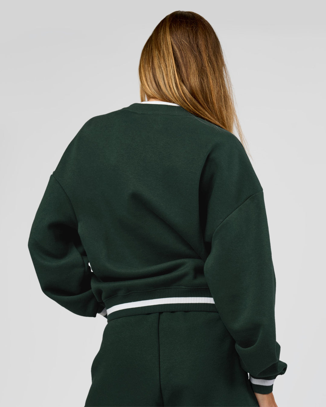 Woman wearing Go-To Dual Oversized Sweater - Midnight Green-White | Model:Georgia | Size:XS - view 6