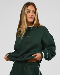 Woman wearing Go-To Dual Oversized Sweater - Midnight Green-White | Model:Georgia | Size:XS | Thumbnail Index: 7