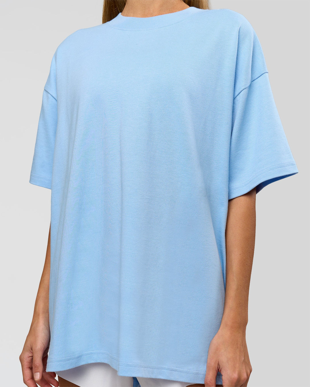 Woman wearing Strong is Beautiful Heavyweight Oversized Tee - Open Air | Model:Georgia | Size:XS - view 9
