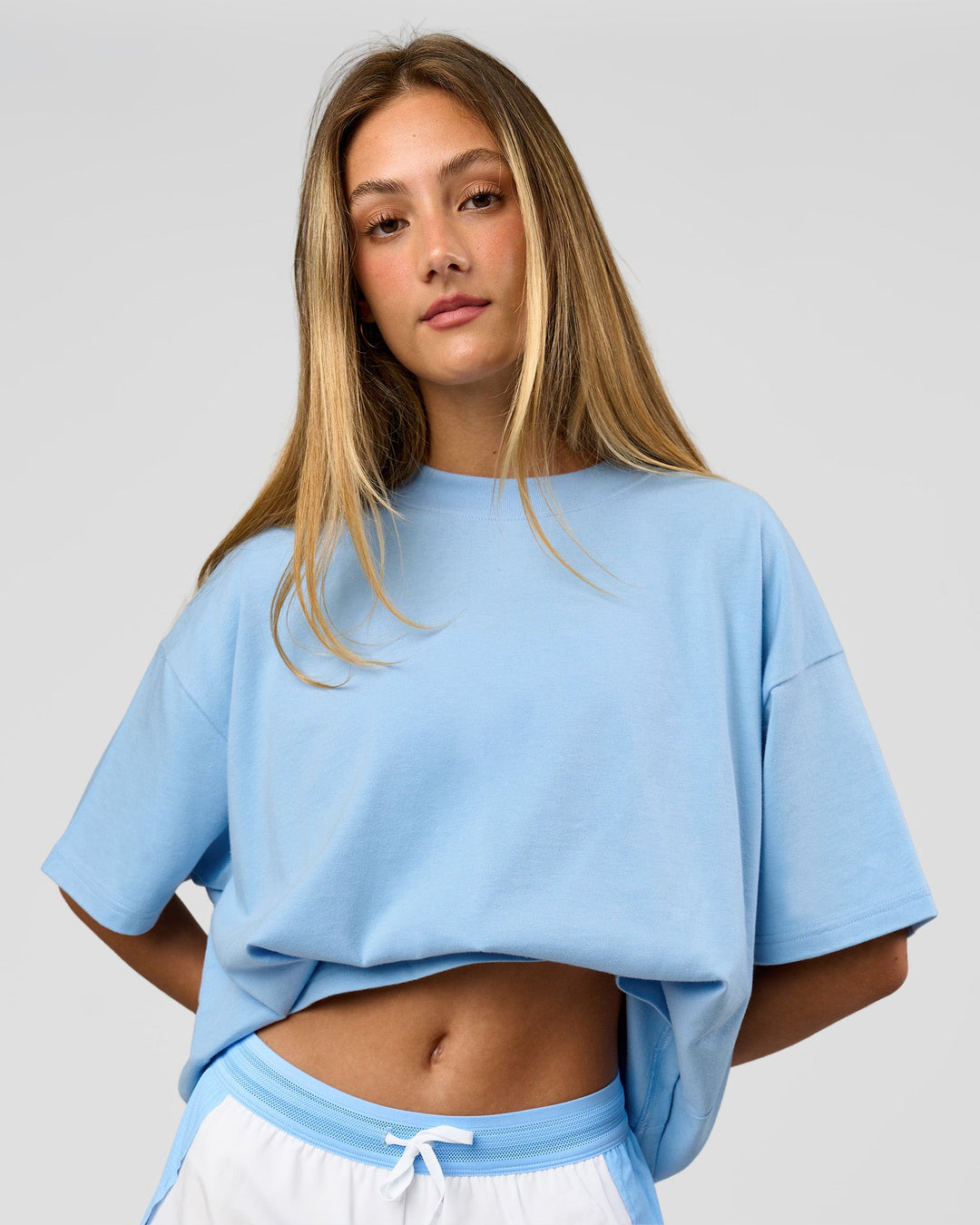 Woman wearing Strong is Beautiful Heavyweight Oversized Tee - Open Air | Model:Georgia | Size:XS - view 14