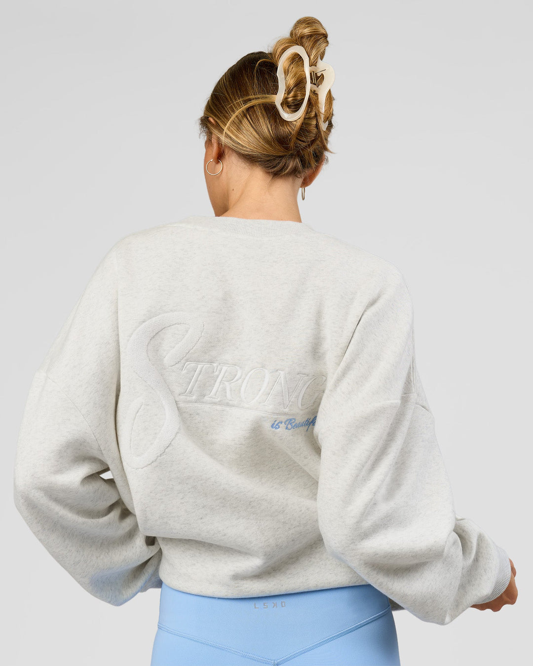 Woman wearing Strong is Beautiful Oversized Sweater - Silver Marl | Model:Georgia | Size:XS - view 7