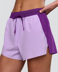 Woman wearing Accelerate 3" High-Rise Running Short - Chloe Purple | Model:Issy | Size:XS | Thumbnail Index: 0