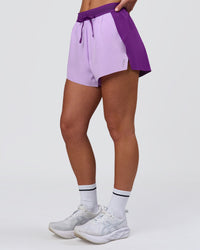 Woman wearing Accelerate 3" High-Rise Running Short - Chloe Purple | Model:Issy | Size:XS | Thumbnail Index: 2