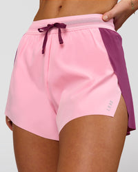 Woman wearing Accelerate 3" High-Rise Running Short - Boysenberry-Pink Rose | Model:Issy | Size:XS | Thumbnail Index: 0