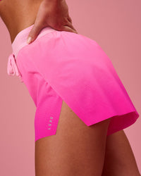 Woman wearing Accelerate Gradient 3" High-Rise Running Short - Pink Rose-Ultra Pink Gradient | Model:Issy | Size:XS | Thumbnail Index: 2