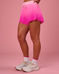 Woman wearing Accelerate Gradient 3" High-Rise Running Short - Pink Rose-Ultra Pink Gradient | Model:Issy | Size:XS | Thumbnail Index: 6