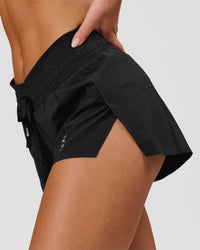 Woman wearing Accelerate Synergy 3" Running Short Short - Black-Black | Model:Issy | Size:XS | Thumbnail Index: 3