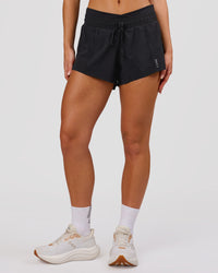 Woman wearing Accelerate Synergy 3" Running Short Short - Black-Black | Model:Issy | Size:XS | Thumbnail Index: 5