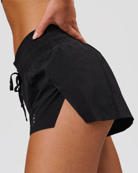 Woman wearing Accelerate Synergy 3" Running Short Short - Black-Black | Model:Issy | Size:XS | Thumbnail Index: 6