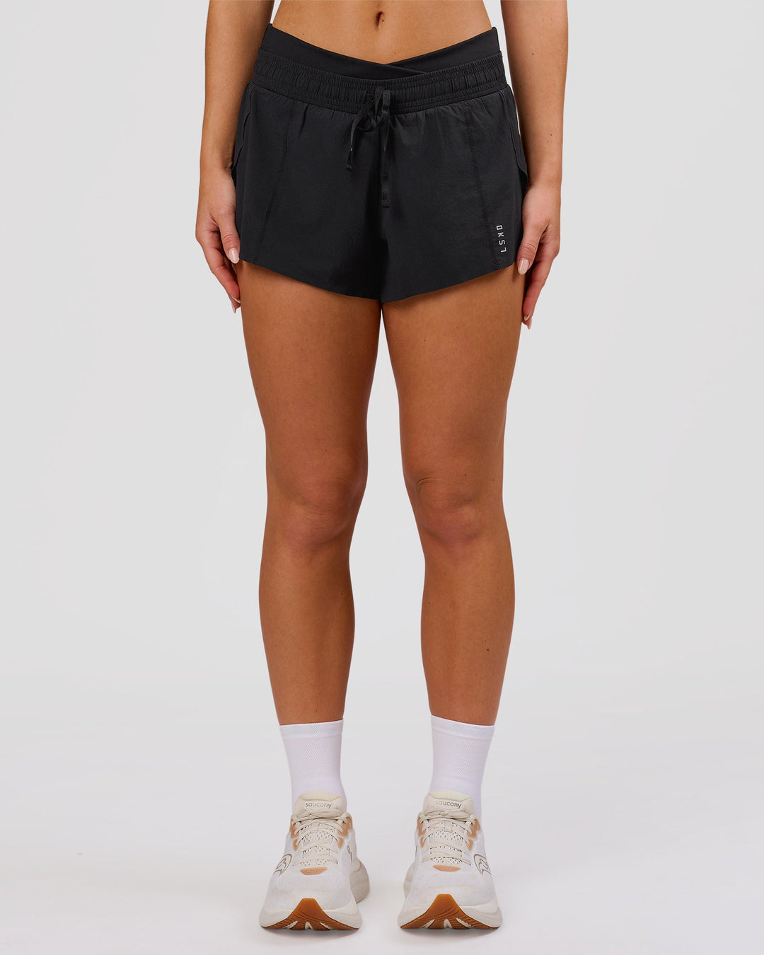 Woman wearing Accelerate Synergy 3" Running Short Short - Black-Black | Model:Issy | Size:XS - view 8
