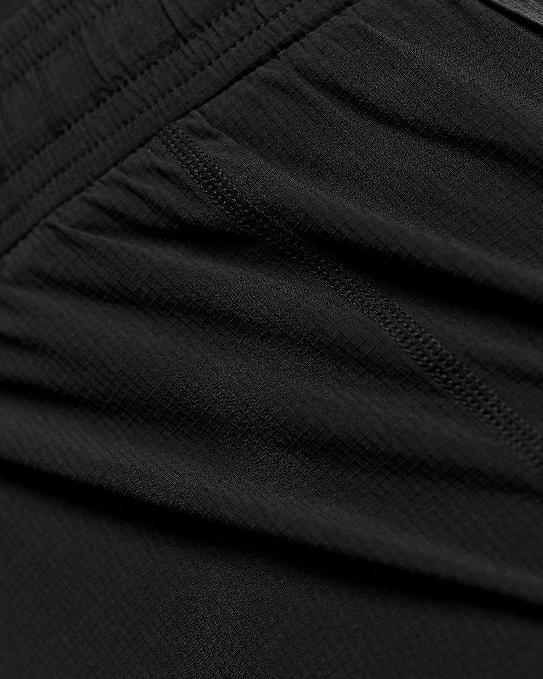 Woman wearing Accelerate Synergy 3" Running Short Short - Black-Black | Model:Issy | Size:XS - view 12
