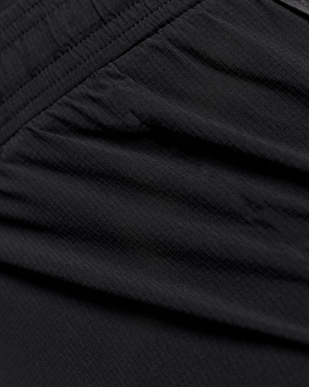 Woman wearing Accelerate Synergy 3" Running Short Short - Black-Black | Model:Issy | Size:XS - view 11
