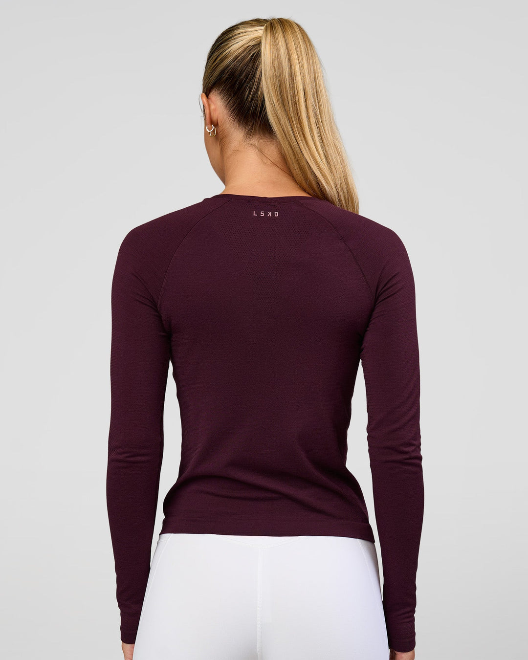 Woman wearing AeroFLX+ Seamless Long Sleeve Tee - Cherry Lacquer/Cherry Lacquer | Model:Issy | Size:XS - view 8