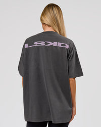 Woman wearing Backline Washed Heavyweight Oversized Tee - Asphalt Washed | Model:Issy | Size:XS | Thumbnail Index: 1