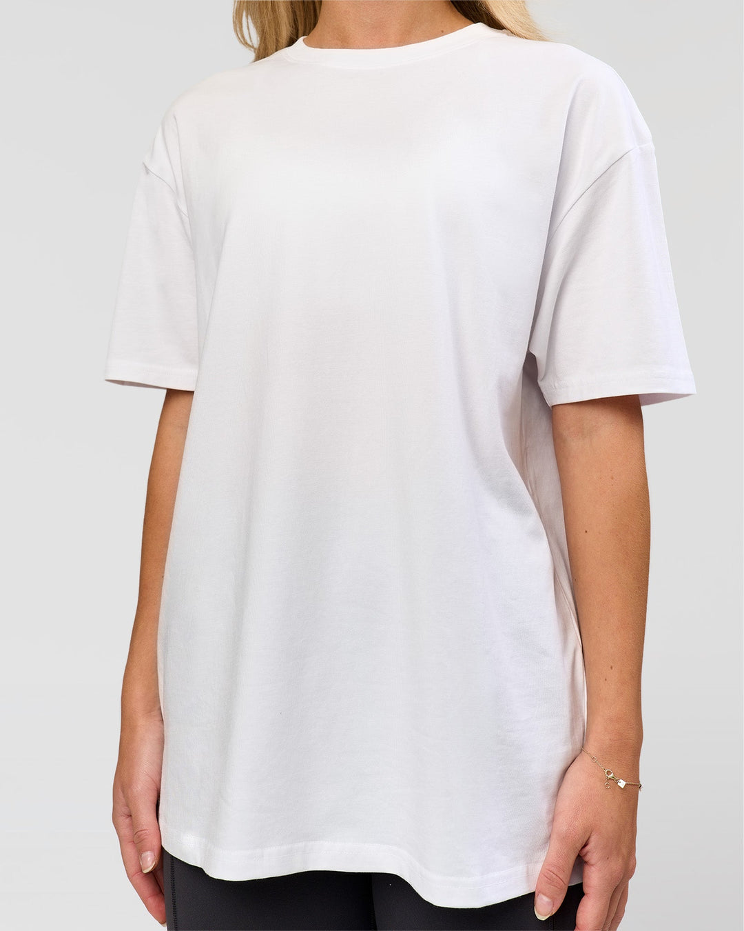 Woman wearing Benchmark FLXCotton Oversized Tee - White-Pale Lilac | Model:Issy | Size:XS - view 9