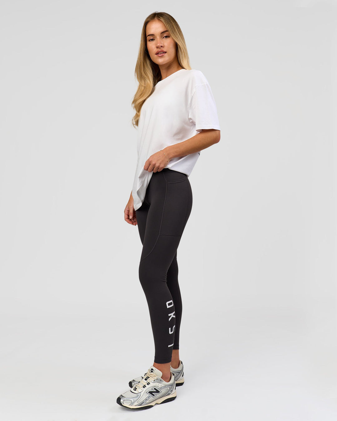 Woman wearing Benchmark FLXCotton Oversized Tee - White-Pale Lilac | Model:Issy | Size:XS - view 14
