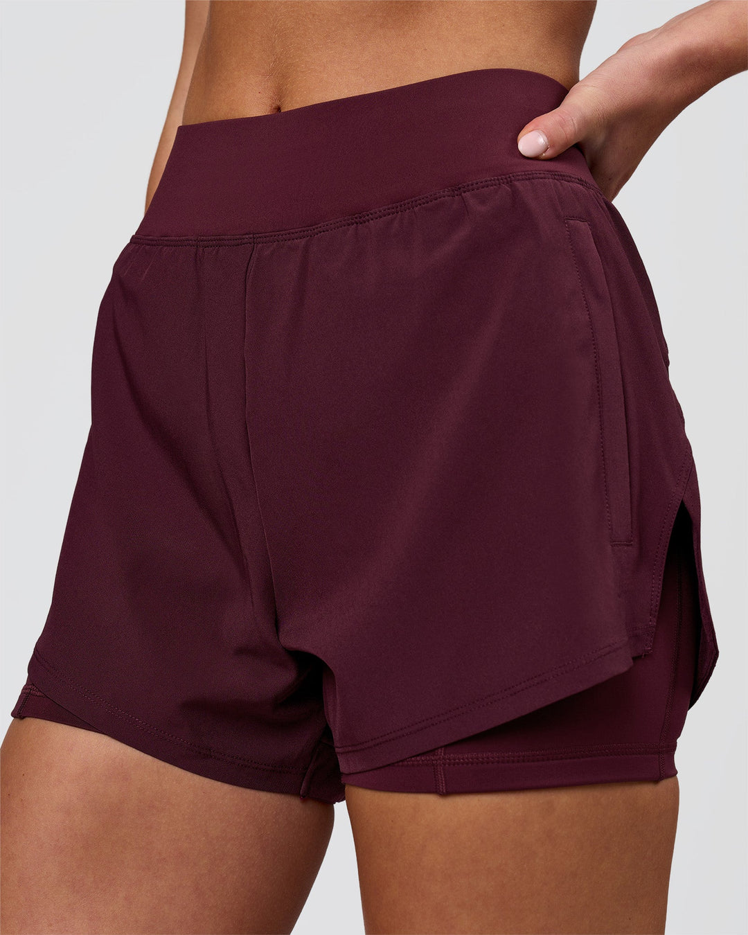 Woman wearing Challenger 3" Lined Performance Short - Cherry Lacquer | Model:Issy | Size:XS - view 1