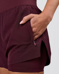 Woman wearing Challenger 3" Lined Performance Short - Cherry Lacquer | Model:Issy | Size:XS | Thumbnail Index: 3