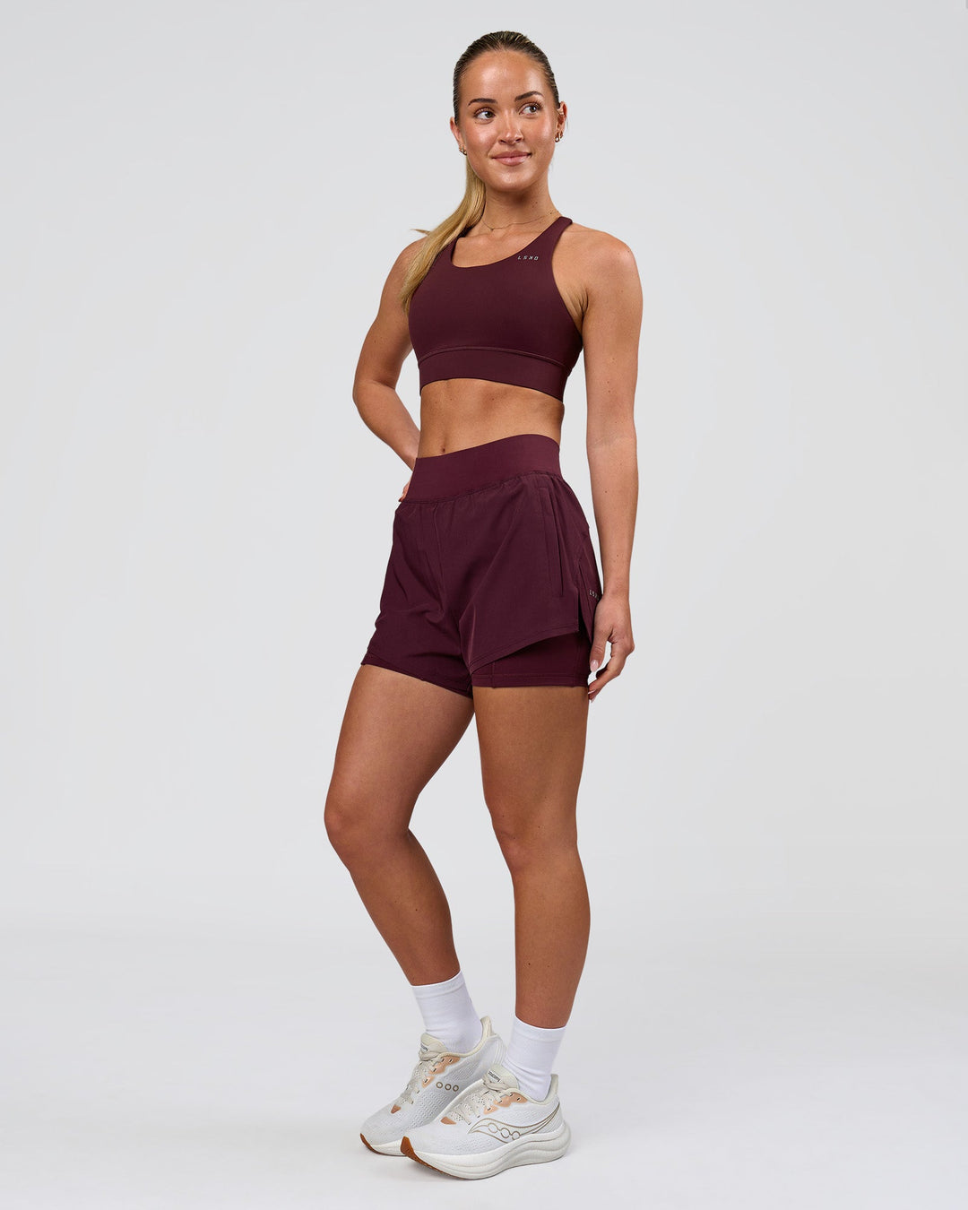 Woman wearing Challenger 3" Lined Performance Short - Cherry Lacquer | Model:Issy | Size:XS - view 6