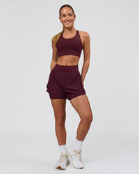 Woman wearing Challenger 3" Lined Performance Short - Cherry Lacquer | Model:Issy | Size:XS | Thumbnail Index: 6