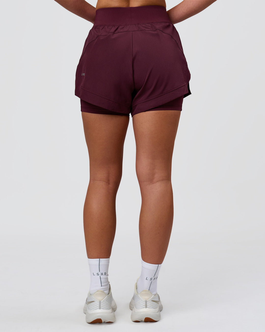 Woman wearing Challenger 3" Lined Performance Short - Cherry Lacquer | Model:Issy | Size:XS - view 11